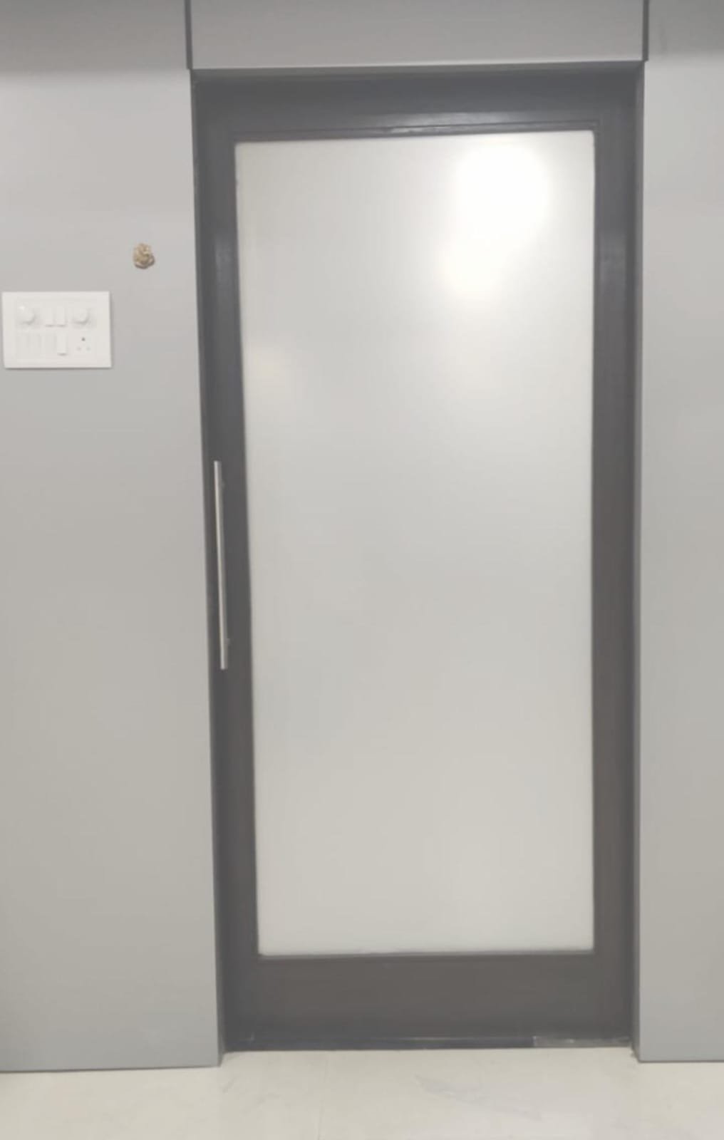 Frosted window film applied to a home glass door